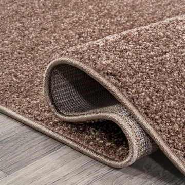 Haze Solid Low-Pile Area Rug Brown